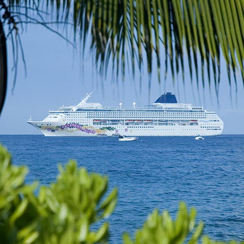 Ship off a tropical coast