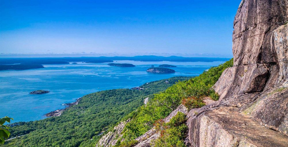 Rocky coastal overlook with islands offshore